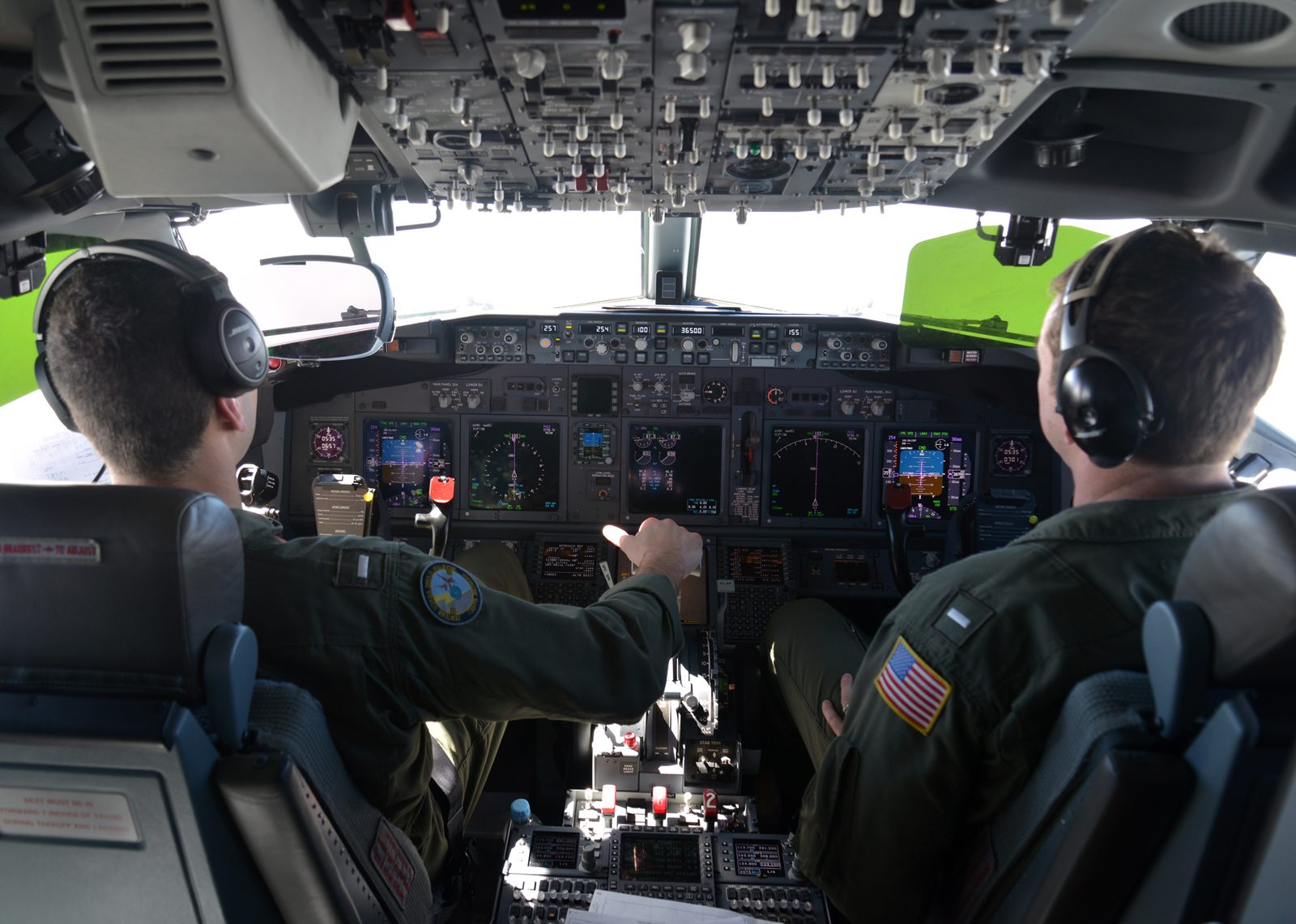 U.S. Navy aviators piloting a P-8A Poseidon during the search and rescue operation for Malaysia Airlines Flight 370