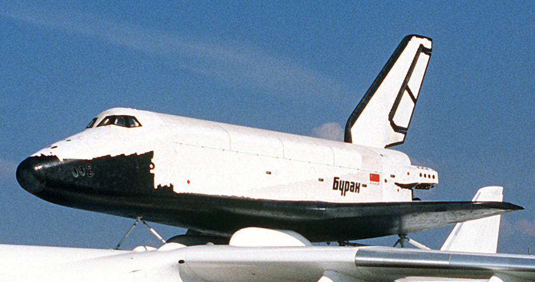 The Soviet Buran space shuttle orbiter mounted atop an An-225 carrier aircraft, Paris Air Show 1989