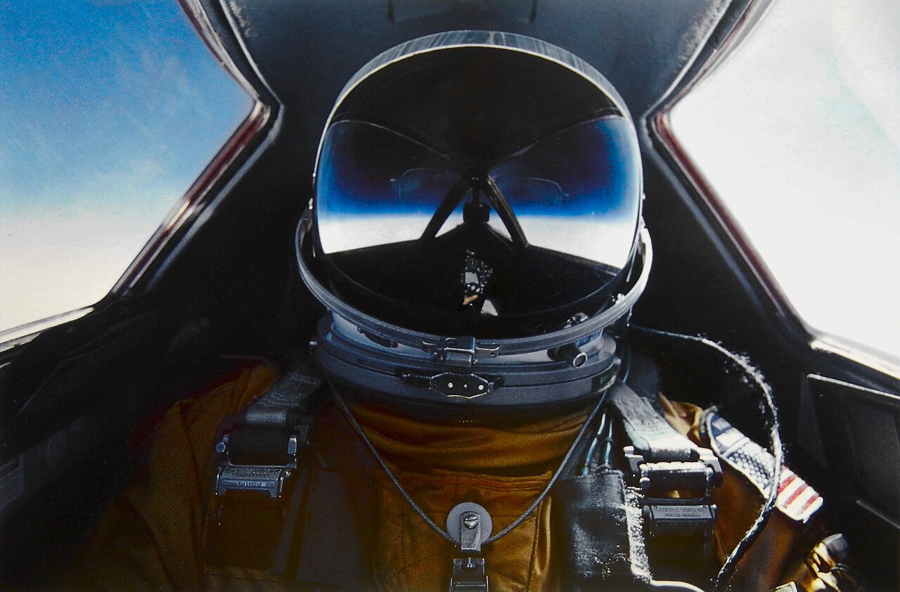 SR-71 pilot Brian Shul in the cockpit, wearing a full pressure suit