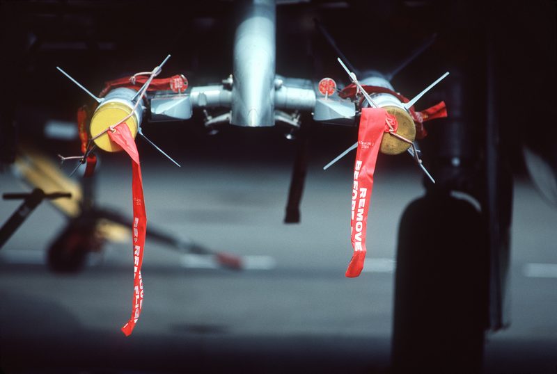 Two AIM-9 Sidewinder air-to-air missiles mounted on the wing pylon of an F-4 Phantom II