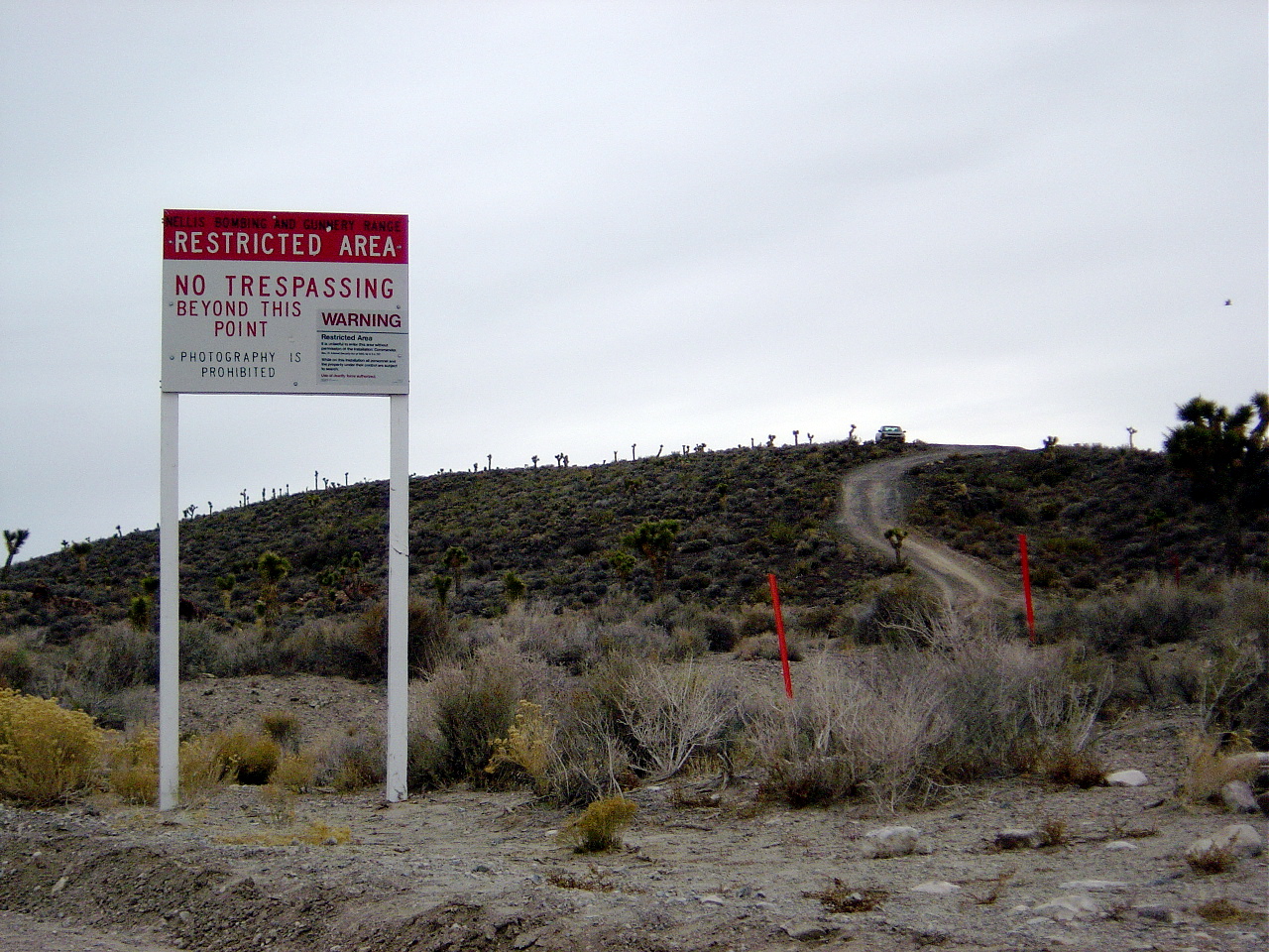 Restricted area warning sign at the boundary of the Nevada Test and Training Range near Groom Lake, Area 51